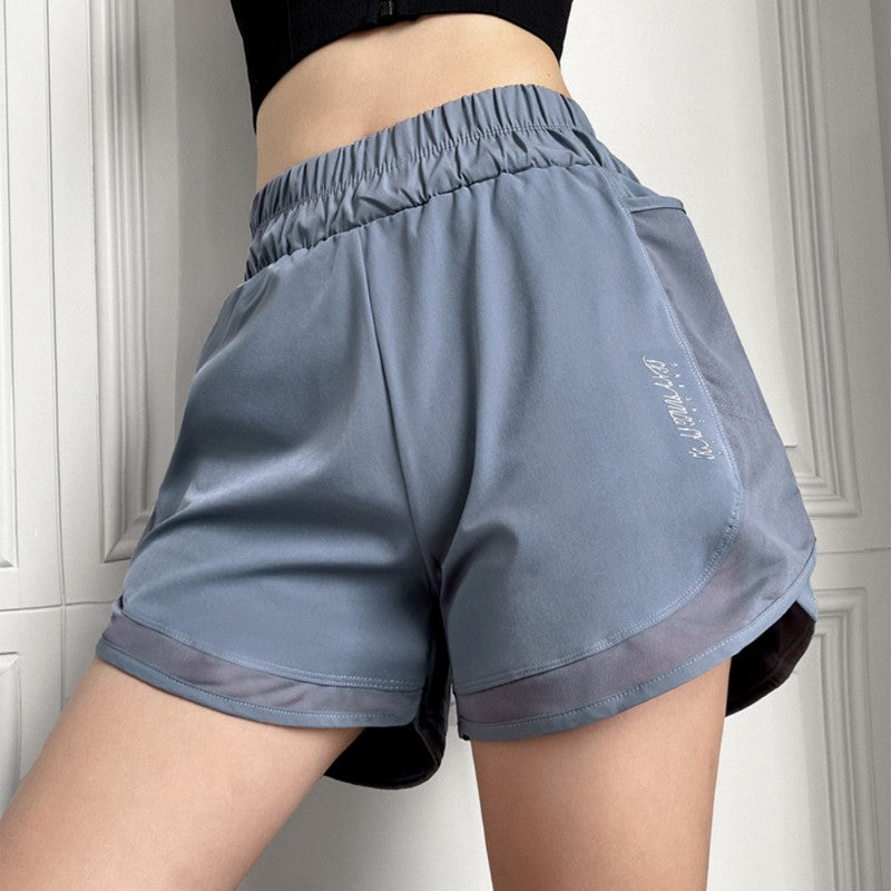Short feminino de corrida com dupla camada e bolso interno