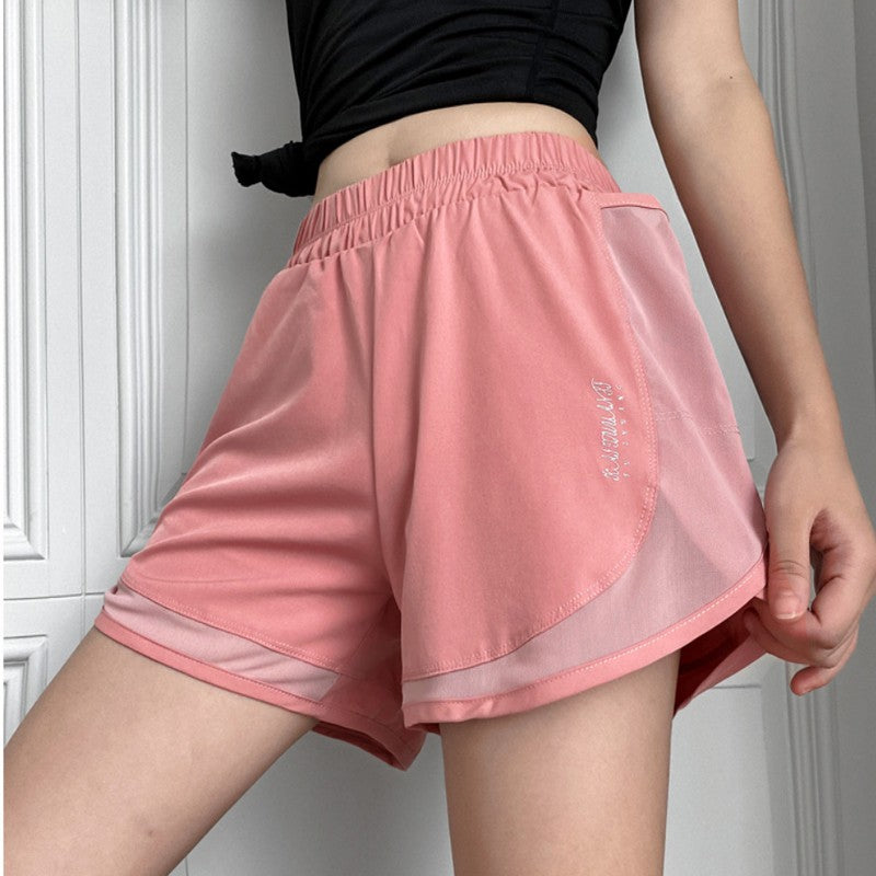 Short feminino de corrida com dupla camada e bolso interno