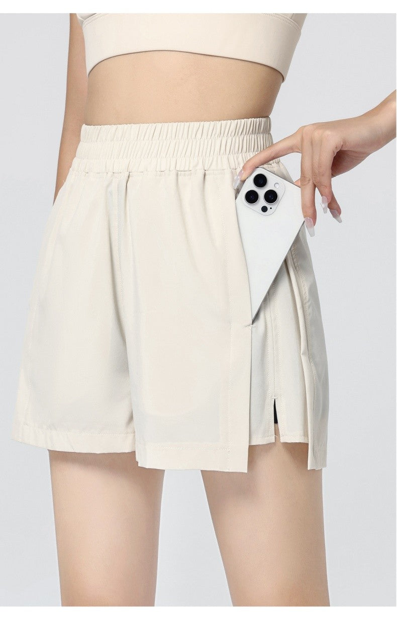 Shorts feminino com cintura de elástico e bolsos